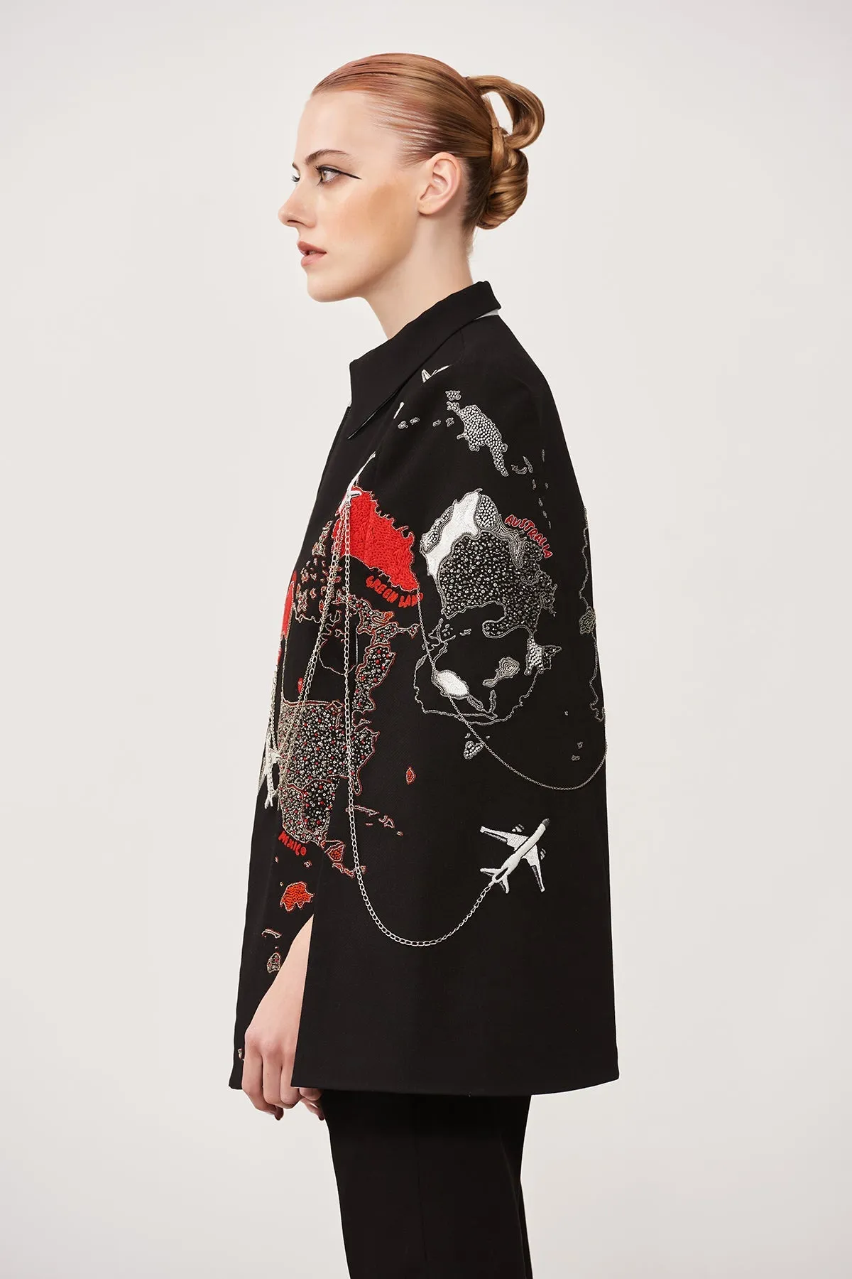 Dee Ghose in Map Cape With Narrow Pants