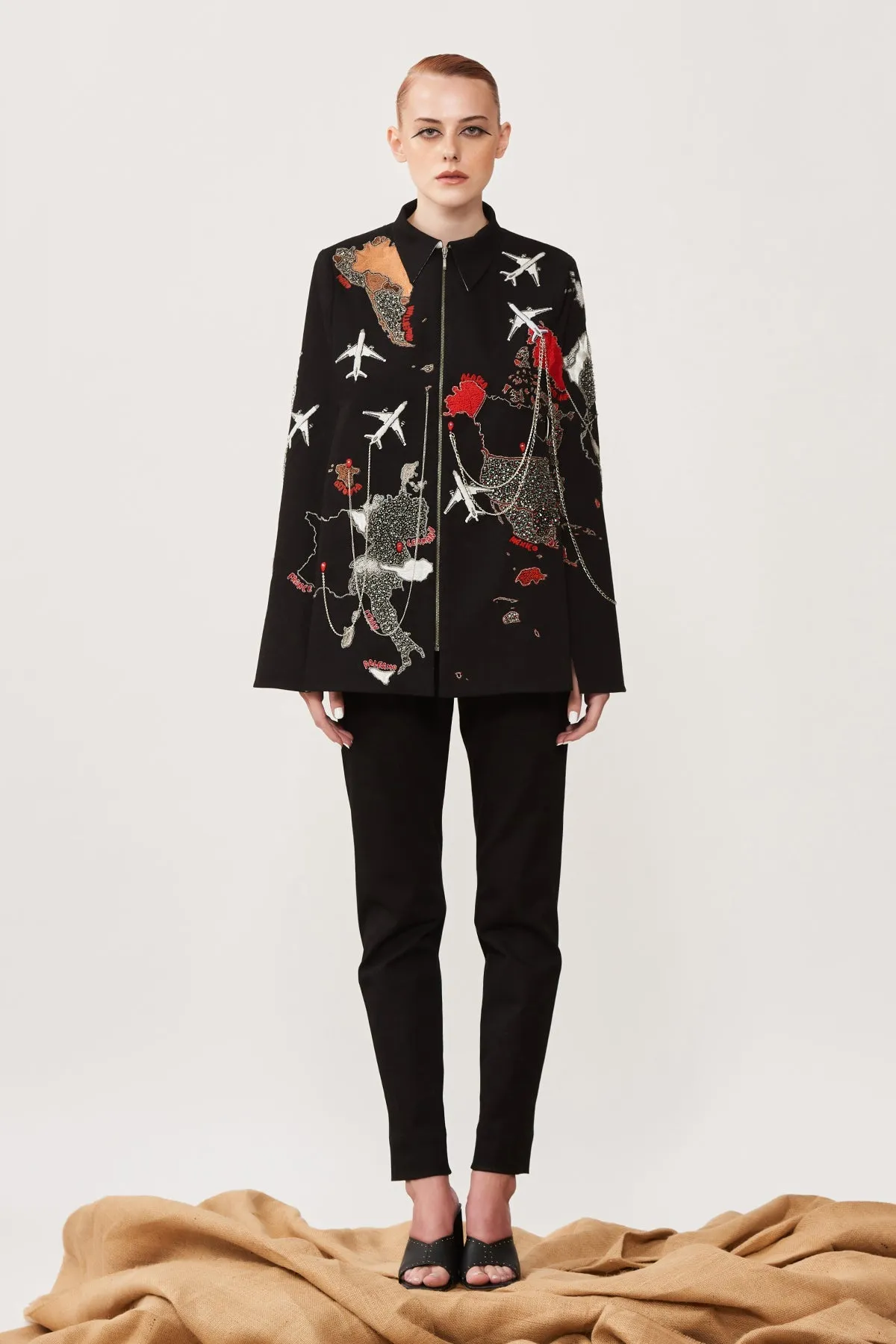 Dee Ghose in Map Cape With Narrow Pants