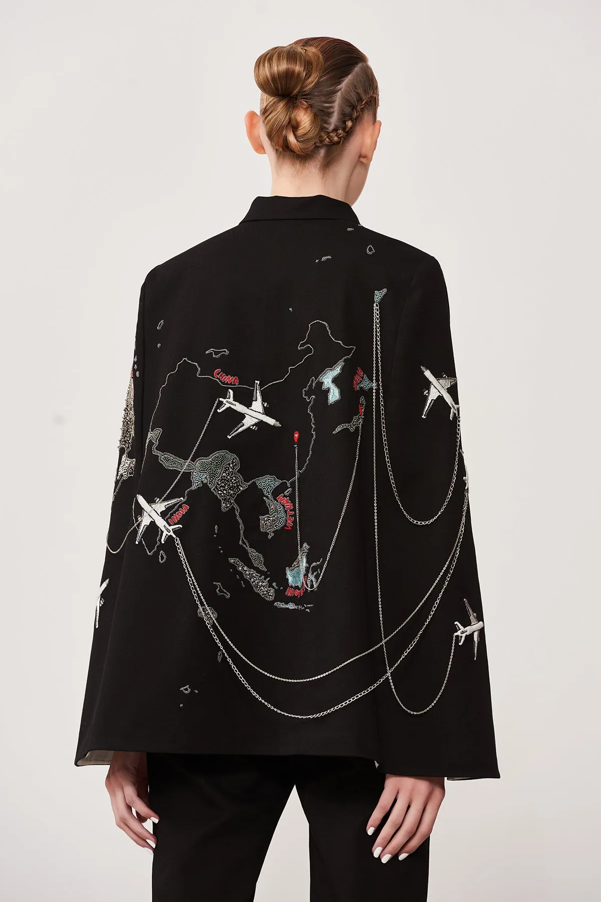 Dee Ghose in Map Cape With Narrow Pants