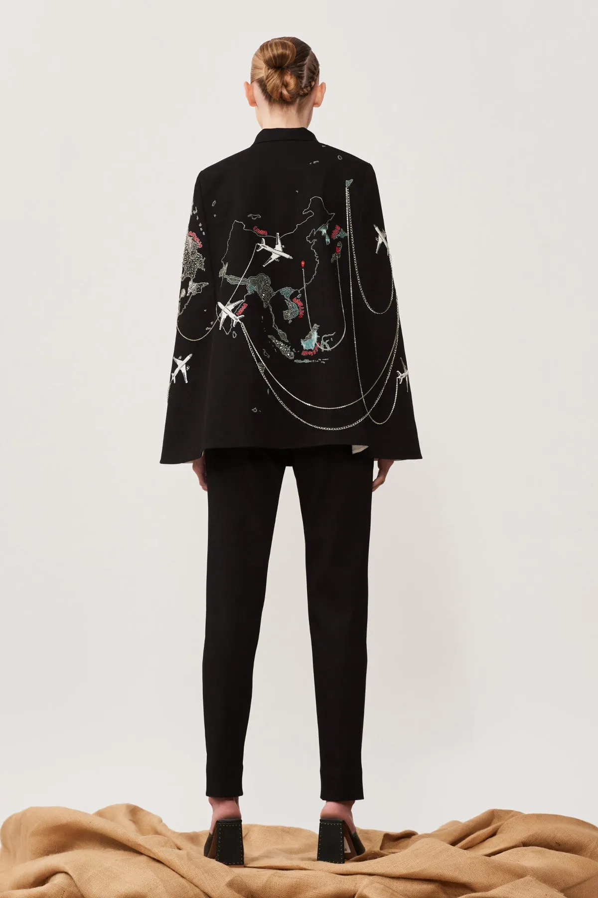Dee Ghose in Map Cape With Narrow Pants