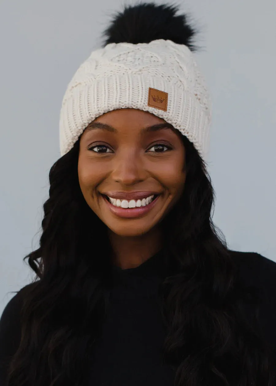 Ivory Cable Knit Fleece Lined Hat w/ Black Pom