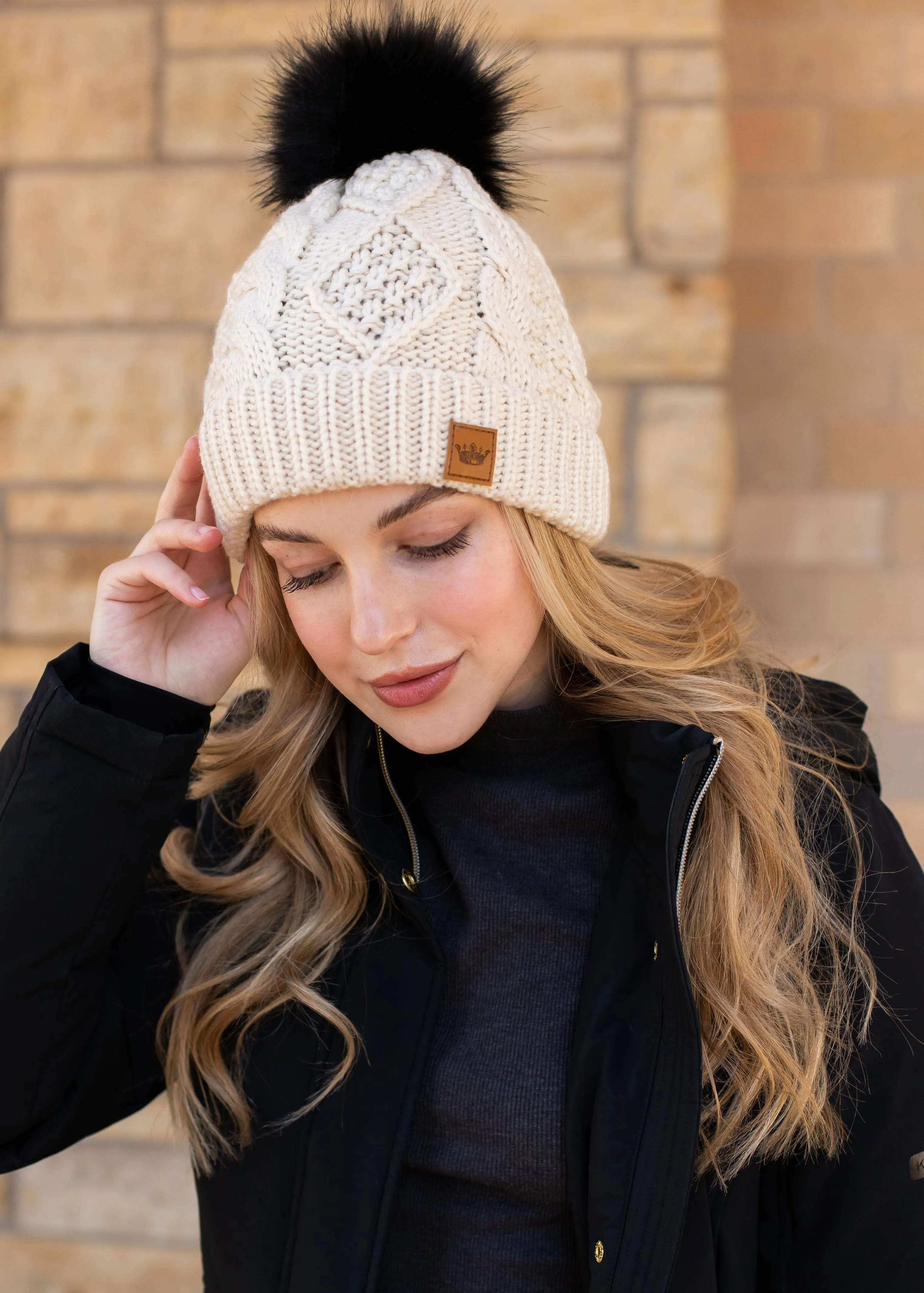Ivory Cable Knit Fleece Lined Hat w/ Black Pom